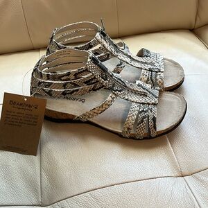 Beautiful new sandals in animal print.